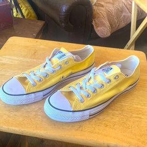 Brand New! Never worn!! Fun yellow Chuck Taylor Converse low tops